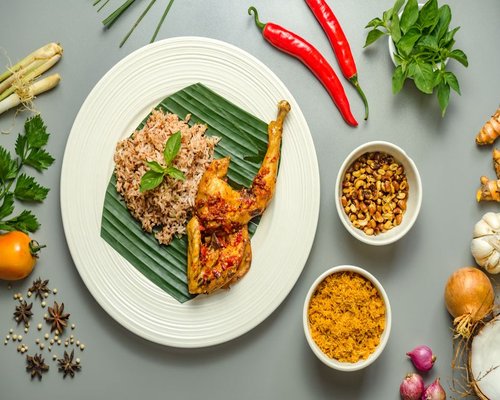 Traditional Indonesian balanced home meal display featuring fresh local items in Bali
